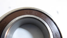 Load image into Gallery viewer, 6005DU - NSK - Single Row Ball BearingBore Diameter: 25 mmOutside Diameter: 47 mmOverall Width: 12 mmClosure Type: 1 SealInternal Clearance: C0-MediumMaterial: Steel