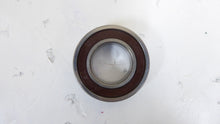 Load image into Gallery viewer, 6005DU - NSK - Single Row Ball BearingBore Diameter: 25 mmOutside Diameter: 47 mmOverall Width: 12 mmClosure Type: 1 SealInternal Clearance: C0-MediumMaterial: Steel