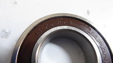 Load image into Gallery viewer, 6005DU - NSK - Single Row Ball BearingBore Diameter: 25 mmOutside Diameter: 47 mmOverall Width: 12 mmClosure Type: 1 SealInternal Clearance: C0-MediumMaterial: Steel