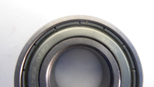 Load image into Gallery viewer, 6004Z - NSK - Deep Groove Ball Bearing
Bore Diameter: 20 mm
Outside Diameter: 42 mm
Overall Width: 12 mm
Bore Type: Round
Internal Clearance: Normal
UPC Number: 029176012549
