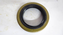 Load image into Gallery viewer, 710319 - Timken - Oil SealsSolid SealSpring LoadedShaft Diameter: 38MM Housing Bore: 58MM Nominal Width: 11MM Lip Material: Nitrile
